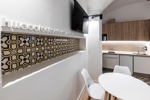 카세레스 Apartamentos Turísticos DE LA BERNARDA (Apartamentos Turisticos DE LA BERNARDA) 4성급 게스트하우스 객실