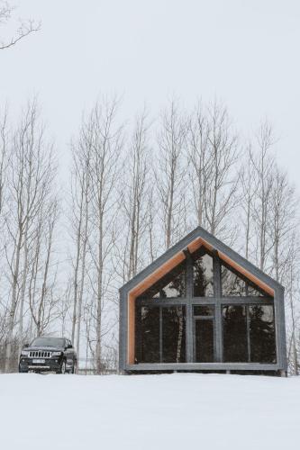Sniegi design cabin with sauna