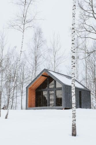 Sniegi design cabin with sauna