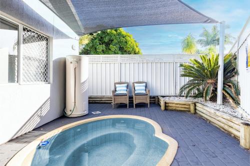 bubbelbad, Banksia at Fingal 1 92 Rocky Point Rd Aircon spa and Wi Fi in Fingal Bay