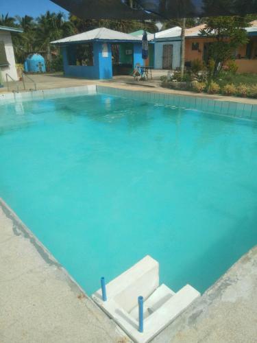Swimming pool, Hideaway Resort in San Remigio