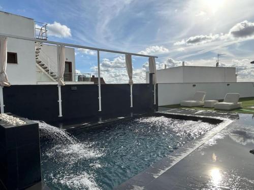 Piscina privada abierta en A morada que Sonhaba