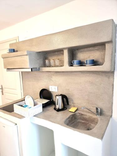 virtuve, Joannes Vacation Rooms in Milos Sala