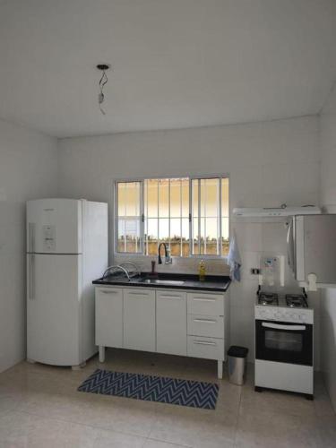 Kitchen, Casa bem localizada near Bom Gosto