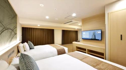 Odysis Suites Osaka Airport Hotel