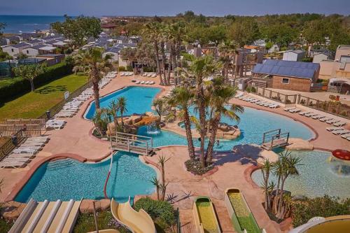 Mobil home zone mer camping Tohapi Marvilla - Camping - Vias