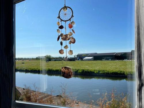 Ferienhaus Jeff am Wasser nähe Ijsselmeer Ferienpark Vislust, Pension in Wervershoof