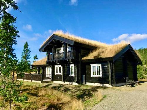 Log cabin on Natrudstilen Sjusjøentrail outside