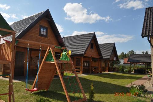 Domki Letniskowe - Accommodation - Sztutowo