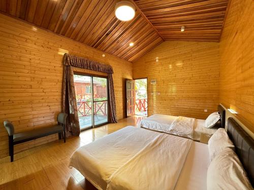 Coconut Garden Resort仙本那顺德人家棕榈园 in เซมปอร์นาแอร์พอร์ต