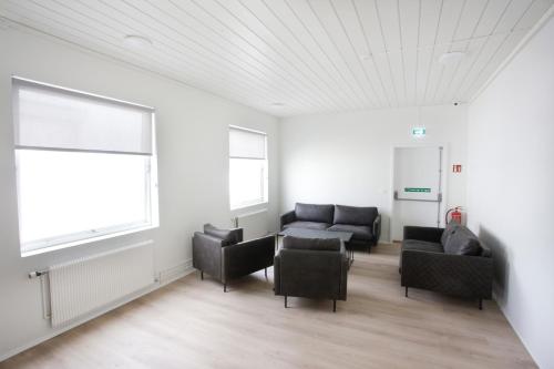 Shared lounge/TV area, Eiðar - Hostel in Egilstadir