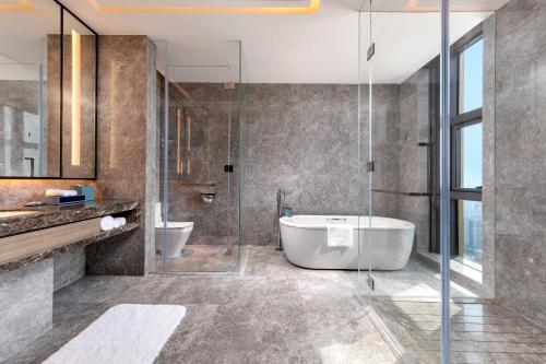 Habitación doble, ejecutiva, deluxe, grand, acceso al salón