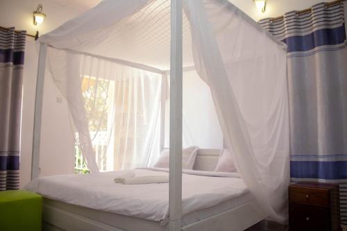 Captains Villa - where Lake Malawi and Shire River meet, historical hotel at waterfront next to the  in Mangochi