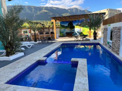 B&B Jarabacoa - B-8 hermoso apartamento al pie de la montaña con piscina total mente equipado - Bed and Breakfast Jarabacoa