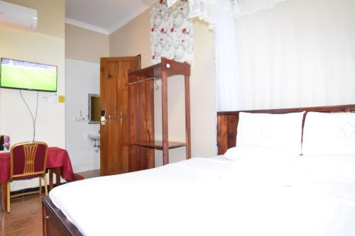 Koplietošanas atpūtas telpa ar TV, BETTER LIFE HOTEL KASULU in Kigoma