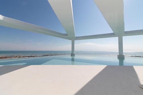 Global Properties, Apartamento con terraza y vistas a la piscina en Gran Canet