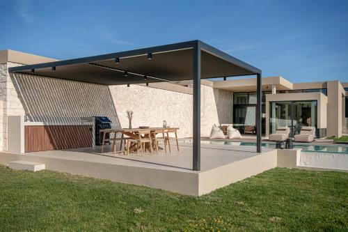 Pnoe Villas - Seafront Experience