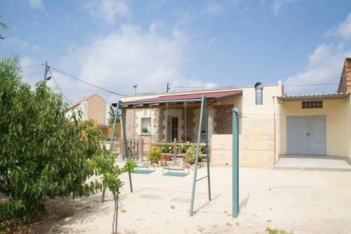 Vista exterior, 3 bedrooms house with enclosed garden and wifi at Camarles 5 km away from the beach in Camarles