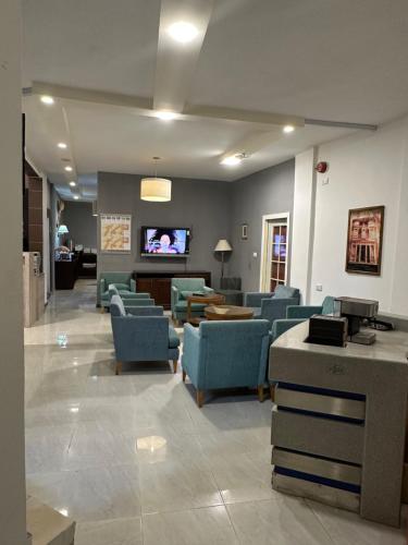 Lounge/area TV in comune, town check-in in Petra