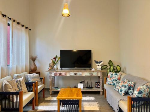 Casa a 3 min andando da Praia de Paúba com WIFI top Casa a 3 min andando da Praia de Paúba com WIFI top