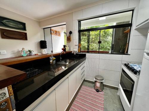 Casa a 3 min andando da Praia de Paúba com WIFI top Casa a 3 min andando da Praia de Paúba com WIFI top