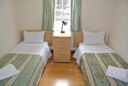 The Belgrove Hotel Room Type - Twin Room with Shared Bathroom
