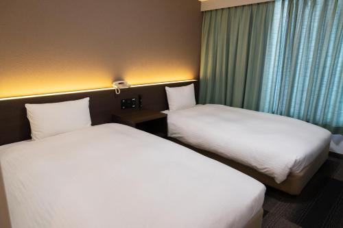 Twin Room - Smoking room in Heiwadai Hotel Tenjin