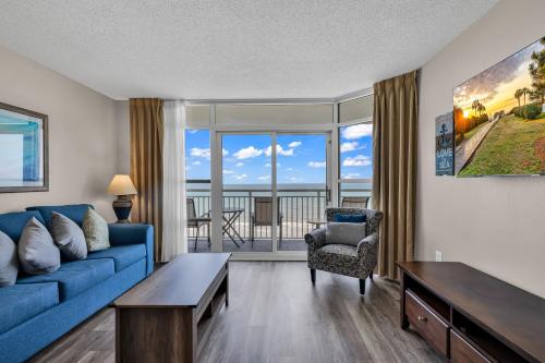 Breathtaking 2BR Condo w Floor-to-Ceiling Windows Overlooking Ocean image