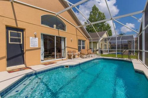 A 4 Bedroom 3 Bathroom Pool villa at Westridge Resort Davenport - main image