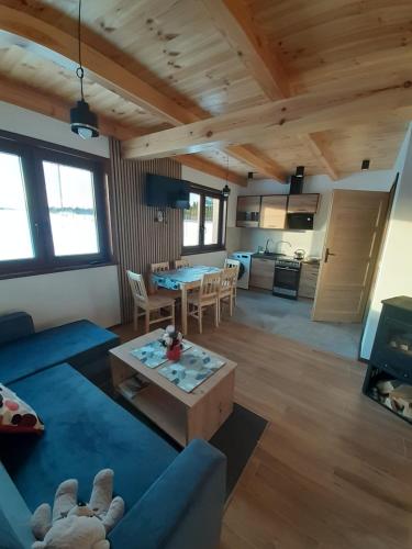 Agroturystyka '' U Adasia i Marysi '' - Domek nad jeziorem in Olpuch