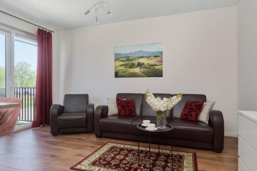 . Comfy Apartment with Parking & Balcony by Noclegi Renters