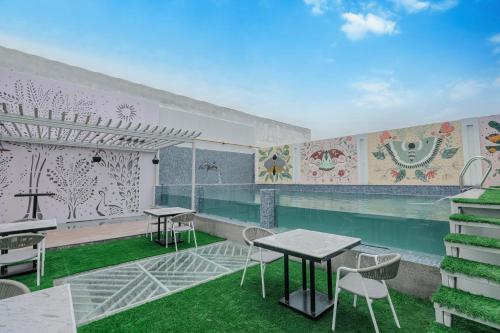 Swimming pool, Regenta Place Bhopal by Royal Orchid HotelsLimited in Bhopal