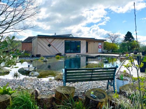 Mid-Wales Farmhouse, swimming pool, tranquil countryside views, sleeps 14 in Meifod