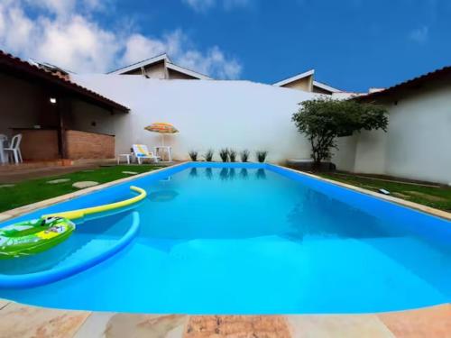 Casa com Mezanino e Piscina