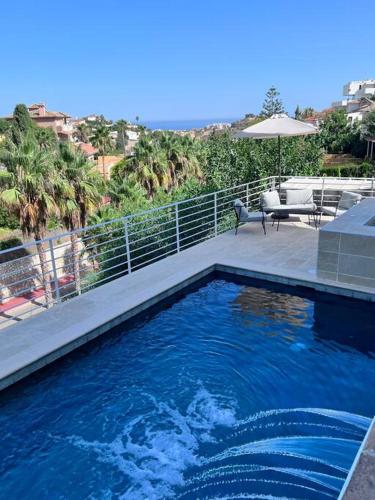 Magnifique logement A avec vue sur mer et piscine, jacuzzi, chauffés, chauffe payant (Magnifique logement A avec vue sur mer et piscine, jacuzzi, chauffes, chauffe payant) in Rancho Domingo