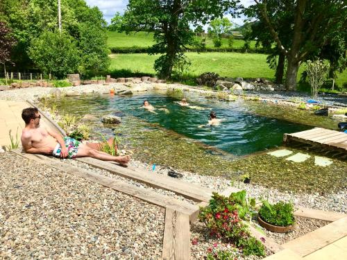 Mid-Wales Farmhouse, swimming pool, tranquil countryside views, sleeps 14 in Meifod