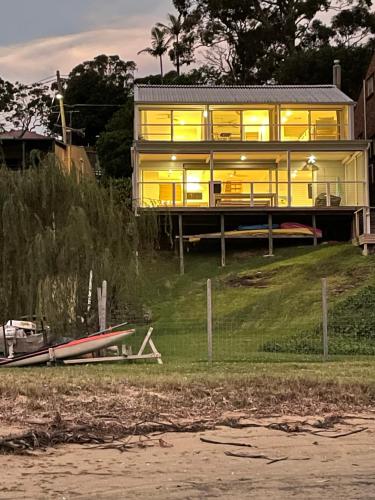 Exterior view, The Sandbar House, Royal National Park, waterfront beach house in Bundeena