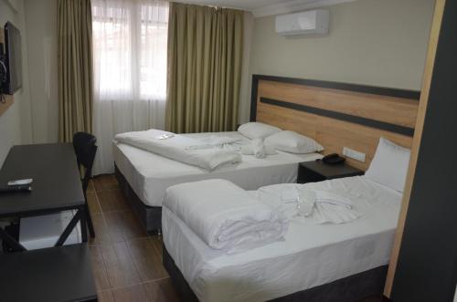 Chambre triple, de luxe
