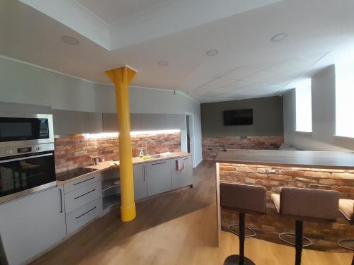 Zajednički dnevni boravak / prostorija s TV-om, ORKANA House in Olsztyn