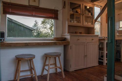 Shepherds Hut in enclosed field