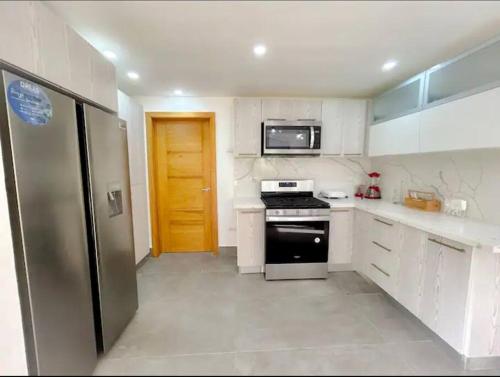 Beautiful Home and Pool near beach , BBQ Juan Dolio metro country Club in Juan Dolio Town Center