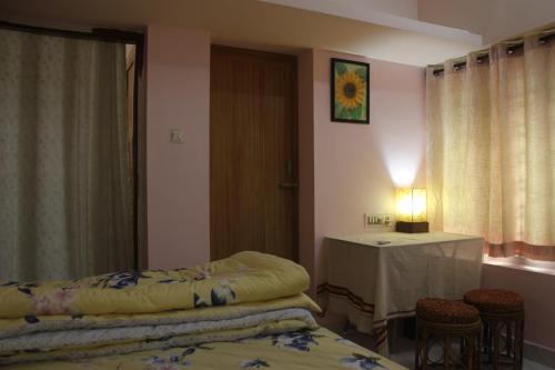 Zaatvm: Cozy room in a 3-room home at Sasthamangalam - only for families and solo women travellers