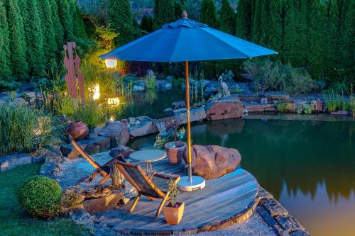 Kert, Glückliche Kuh-Villa - Achtsamer Rückzugsort mit Traumgarten, Schwimmteich & Raum zum Sein - Allgäu (Gluckliche Kuh-Villa - Achtsamer Ruckzugsort mit Traumgarten, Schwimmteich & Raum zum Sein bis 18 Pe) in Mariaberger