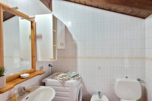 Bathroom, Stylish attic in mountains in Cassina Valsassina