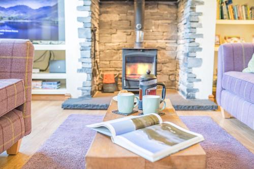 Clemmies Cottage Coniston - Tap to explore photos