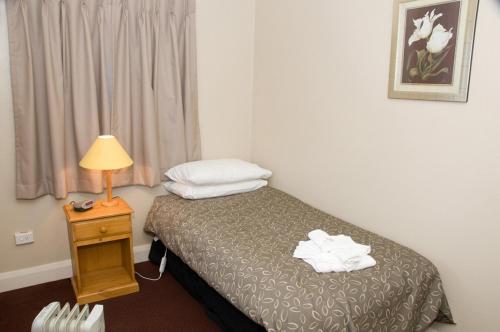 Single Room with Shared Shower and Toilet