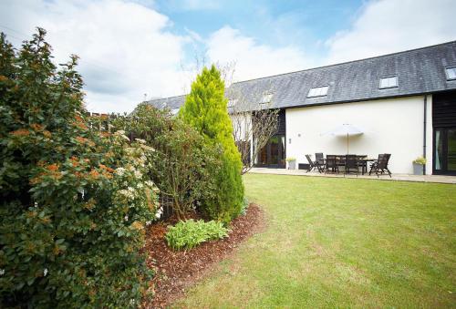 Viesnīcas āriene, Lower Curscombe Barn in Feniton
