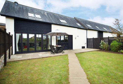 Viesnīcas āriene, Lower Curscombe Barn in Feniton