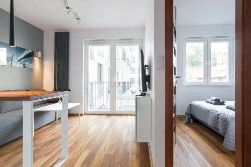 Modern and comfortable with a bedroom - Tap to explore photos