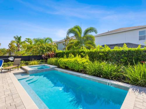 Chic Home With Private Pool & Game Room near Disney by Rentyl - 451N - image 3